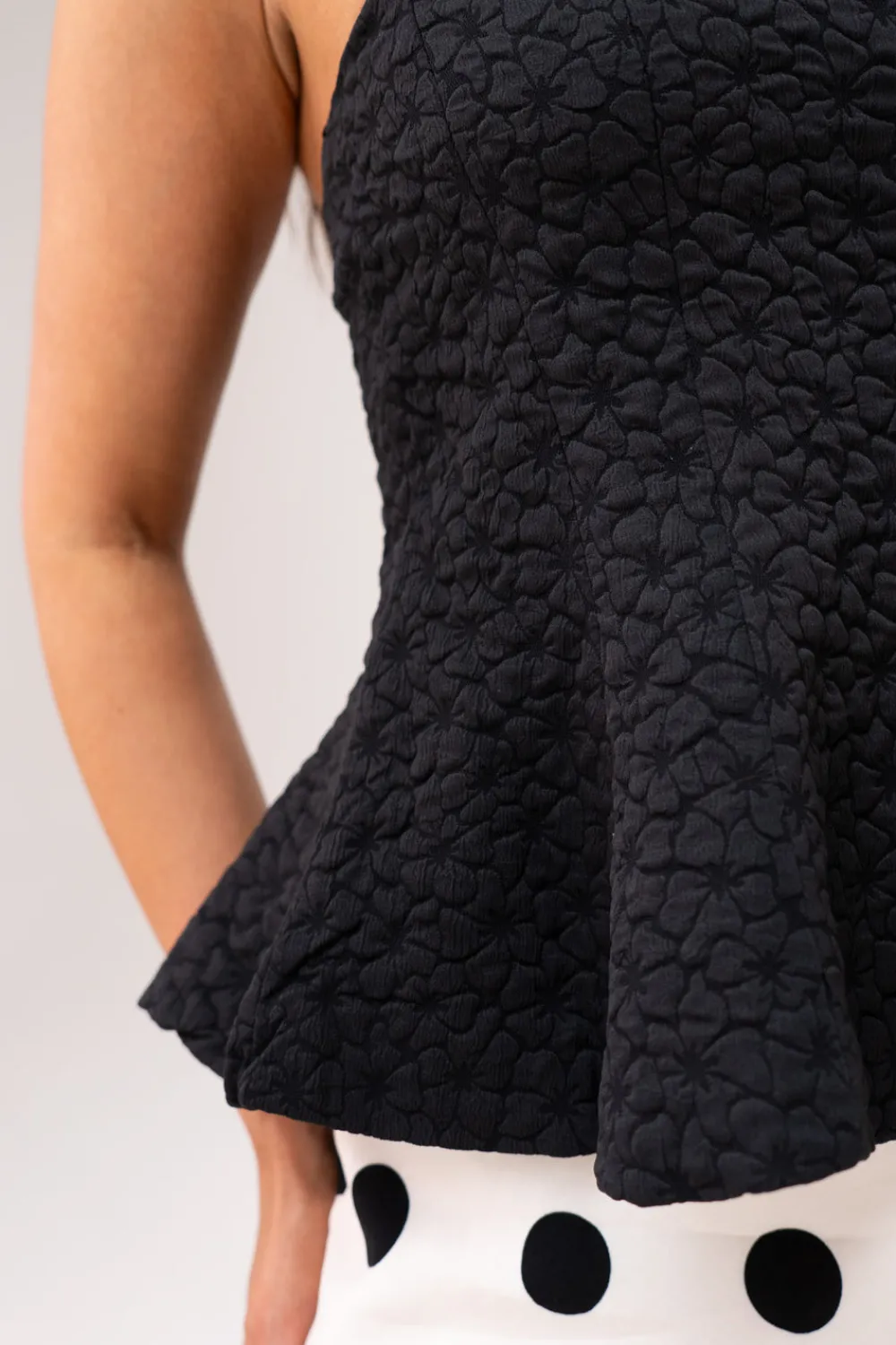 The Walk in Wardrobe Tops>Iris Textured Peplum Top In Black