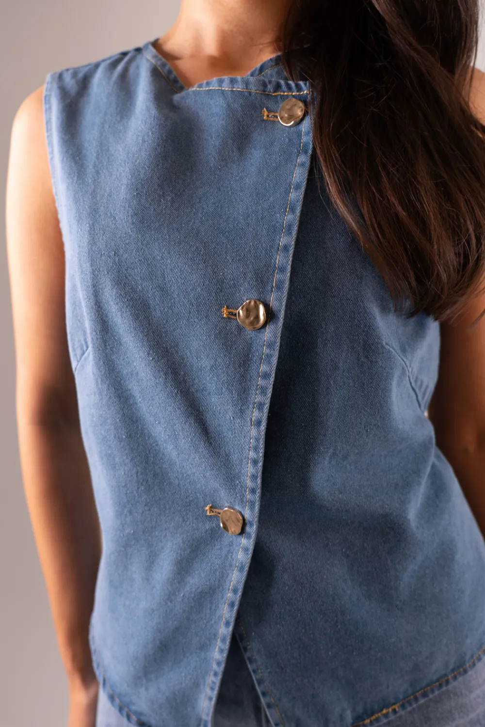 The Walk in Wardrobe Tops>Kendra Asymmetric Denim Waistcoat In Mid Wash