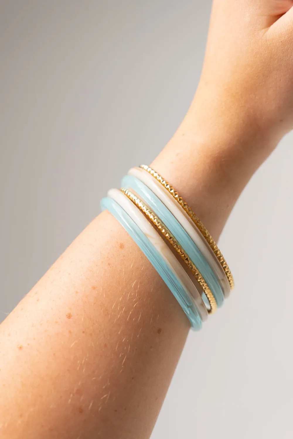 The Walk in Wardrobe Jewellery>Olive Gold Mix Bangle Stack In Blue